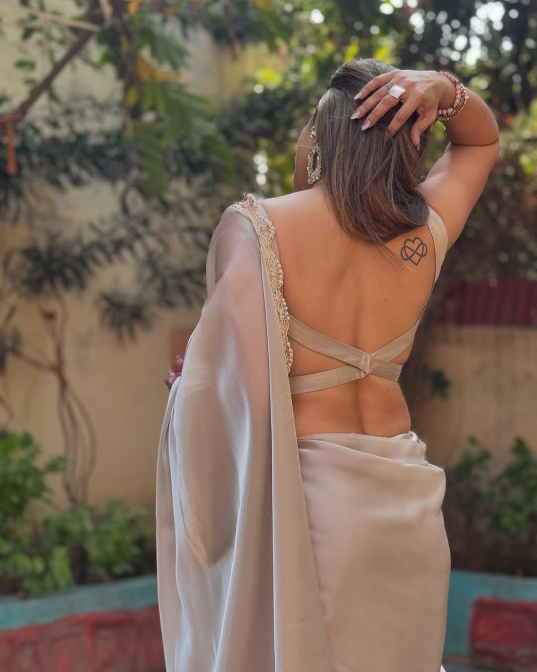 Ivory Beige Elegant Saree with Stylish Backless Designer Look