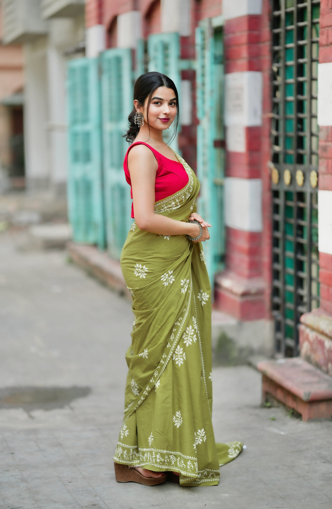 Olive Green Traditional Saree With Elegant Ethnic Print
