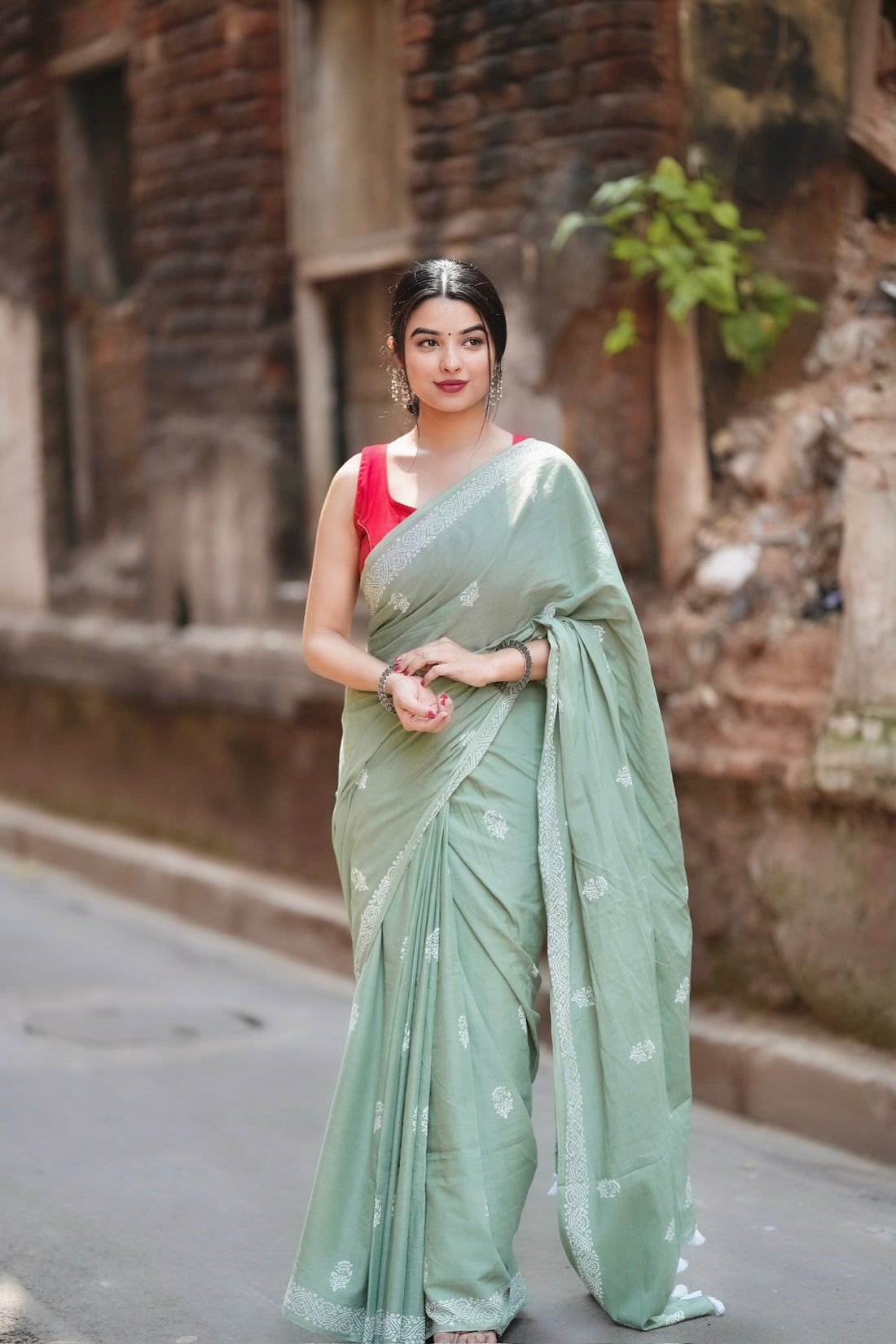 Mint Green Traditional Saree With Elegant Butti Design