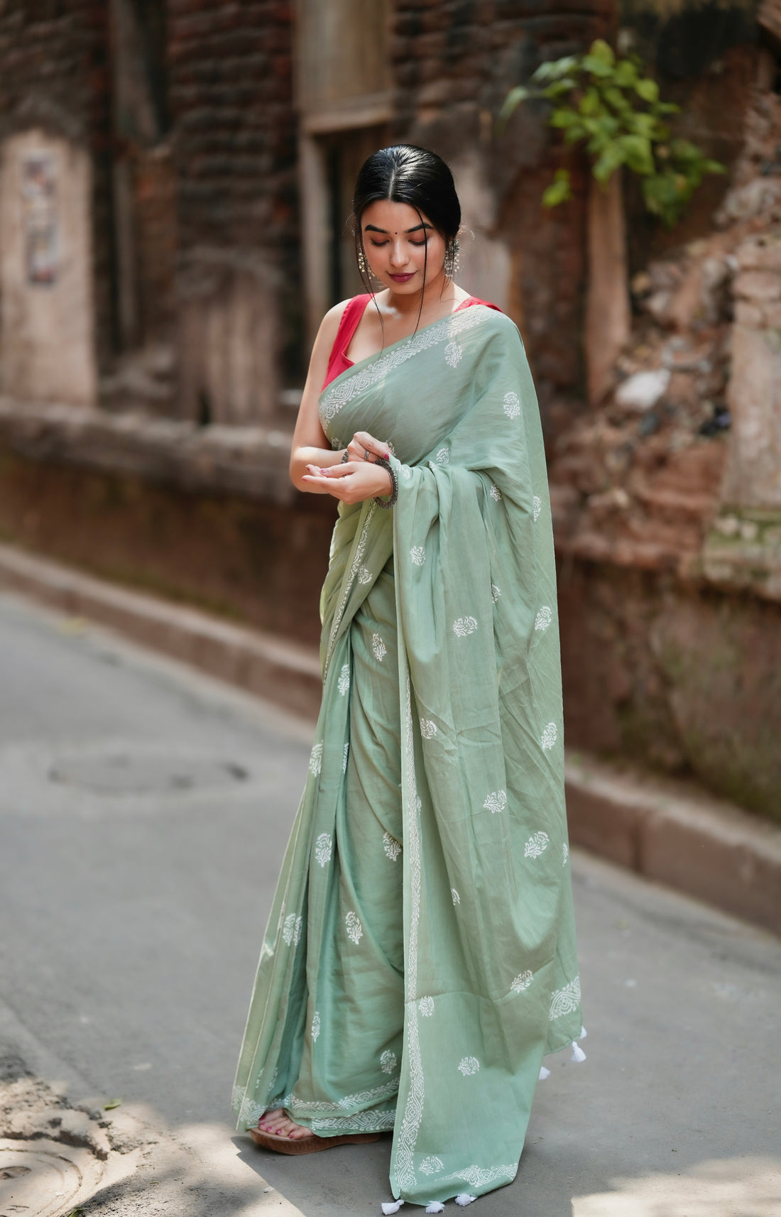 Mint Green Traditional Saree With Elegant Butti Design