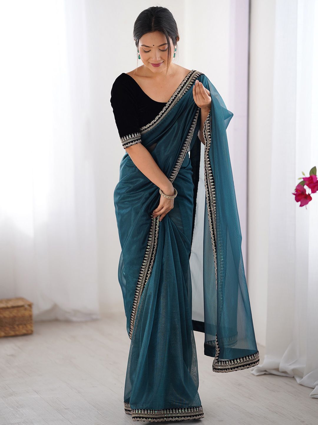 Teal Blue Traditional Saree with Rich Silver Border Work