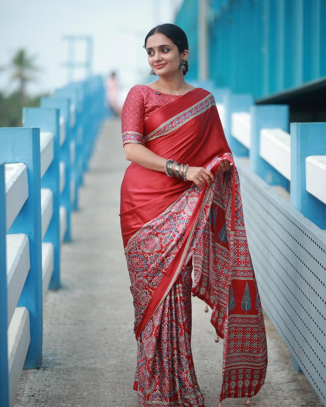Women Red Traditional Printed Saree with Elegant Ethnic Border Design