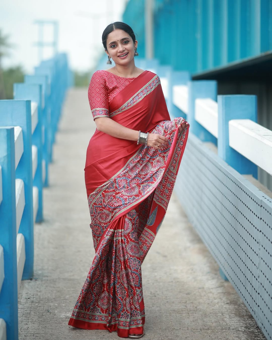 Women Red Traditional Printed Saree with Elegant Ethnic Border Design