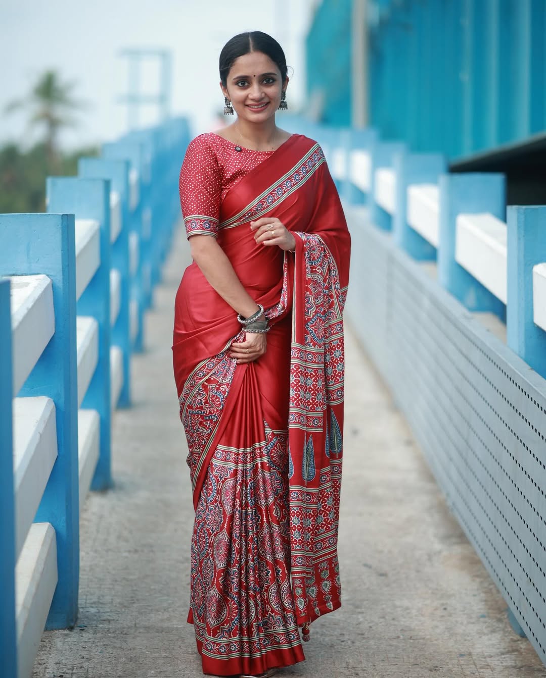 Women Red Traditional Printed Saree with Elegant Ethnic Border Design