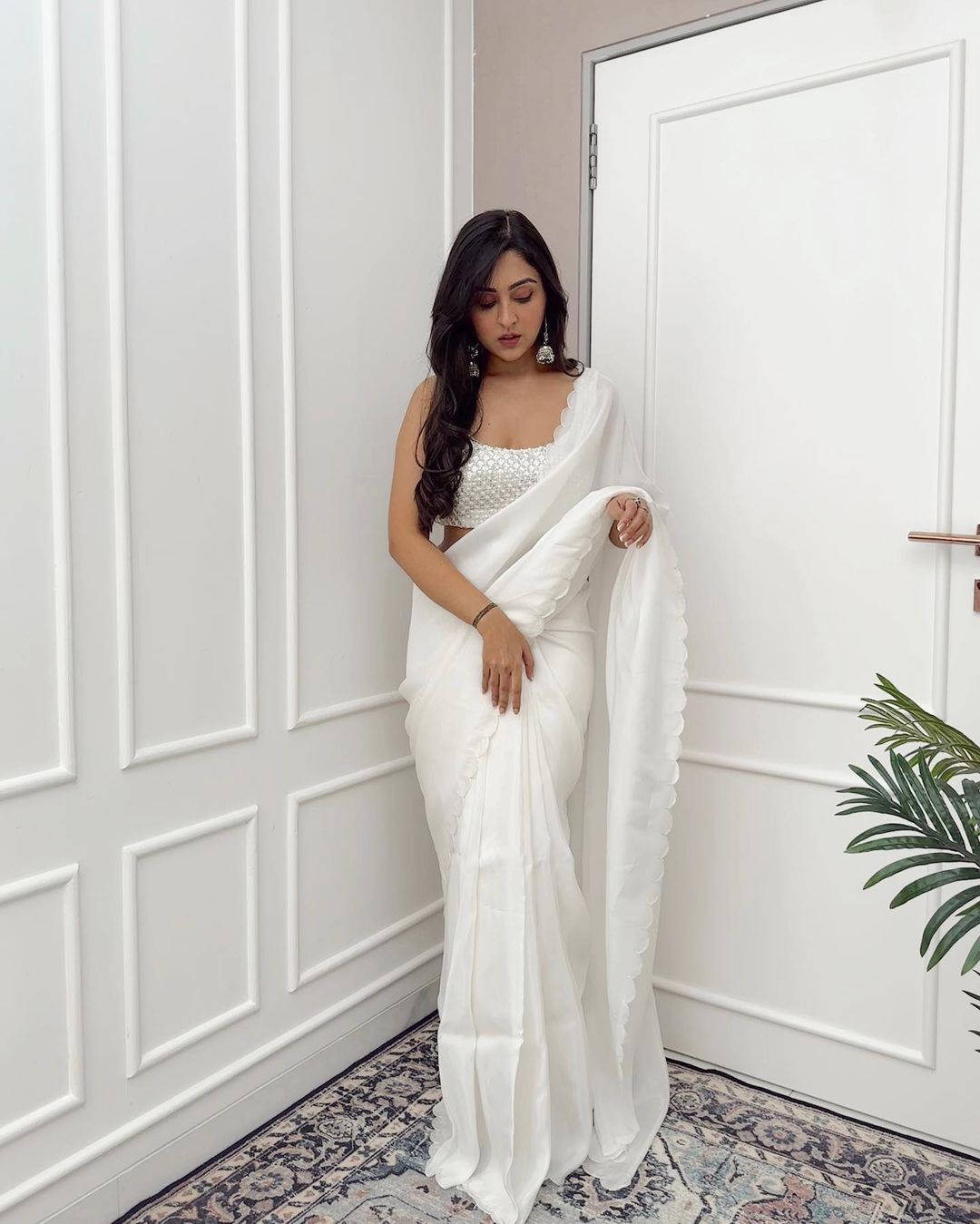 White Elegant Saree With Stylish Traditional Drape