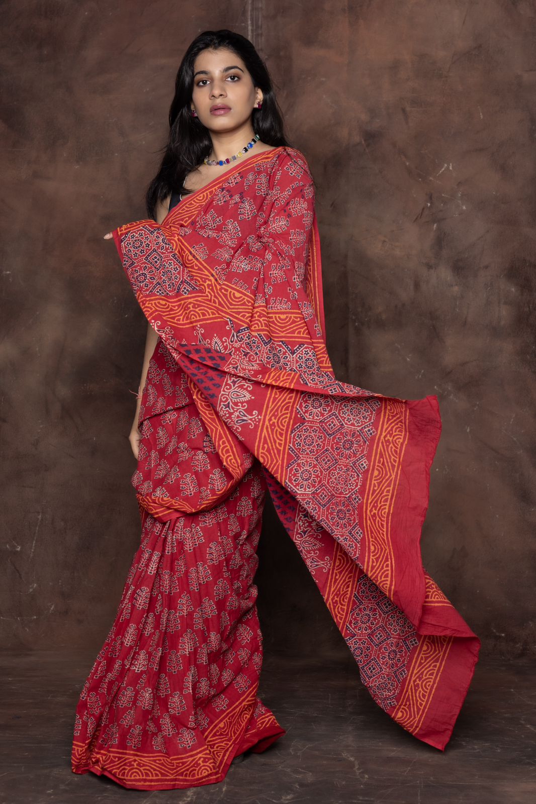 Red Traditional Printed Saree With Elegant Ethnic Design