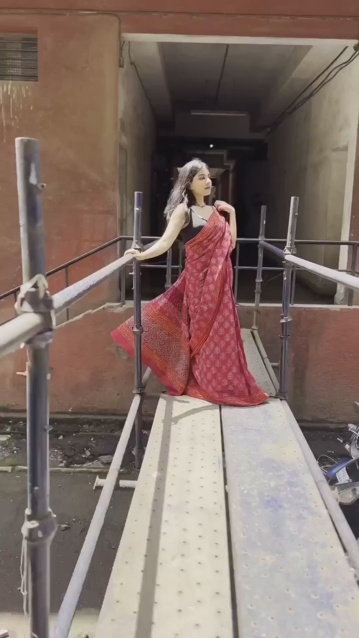 Red Traditional Printed Saree With Elegant Ethnic Design