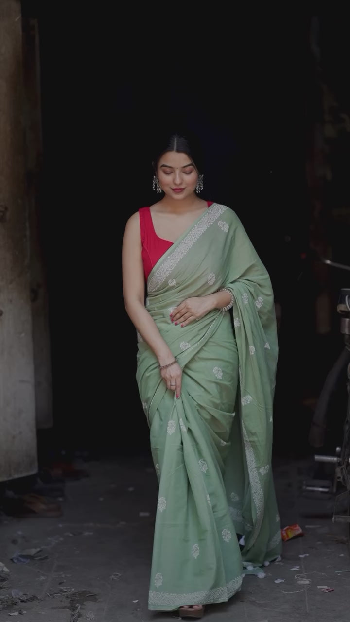 Mint Green Traditional Saree With Elegant Butti Design